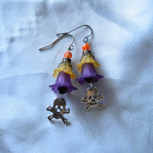 purple/orange skull earrings